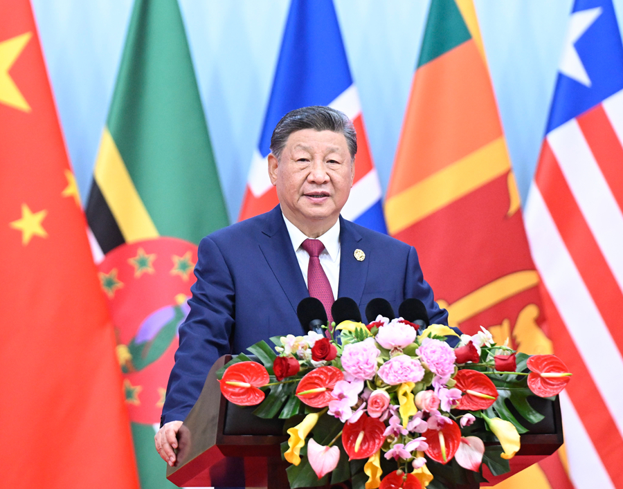 习近平出席全球妇女峰会开幕式并发表主旨讲话